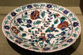 Earthenware dish with floral design from Iznik, Turkey at San Antonio Museum of Art. San Antonio, TX.