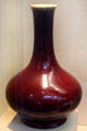 Qing dynasty stoneware ox-blood bottle vase from China at San Antonio Museum of Art. San Antonio, TX.