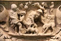 Roman marble garland sarcophagus with carved detail of Romans with dogs at San Antonio Museum of Art. San Antonio, TX.