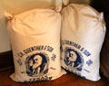 Flour sacks with images of mill founder Carl Hilmar Guenther at Guenther House Museum. San Antonio, TX.