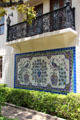 Peacock tile mural & wrought iron balcony on patio at McNay Art Museum. San Antonio, TX.