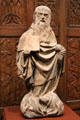 St Anthony Abbot & hog symbol limestone sculpture from Burgundy, France at McNay Art Museum. San Antonio, TX.