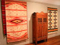 Native woven blankets & cabinet from New Mexico at McNay Art Museum. San Antonio, TX.