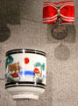Japanese painted cup & Red Cross medal captured on Okinawa at National Museum of the Pacific War. Fredericksburg, TX.