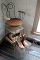 Shoeshine chair in Arhelger Bath House at Pioneer Museum. Fredericksburg, TX.