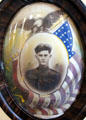 Picture of U.S. Soldier from WWI framed by eagle & American flag at Capt. Charles Schreiner Mansion. Kerrville, TX.