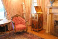 Armchair & Victrola in pink parlor at McFaddin-Ward House. Beaumont, TX.
