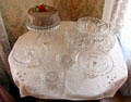 Pressed glass collection including punch bowl & cake stands at Chambers House Museum. Beaumont, TX.