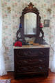 Dresser with mirror in Ruth Chambers' bedroom at Chambers House Museum. Beaumont, TX.