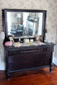 Dresser with mirror in elder Chambers' bedroom at Chambers House Museum. Beaumont, TX.