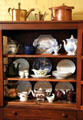 Hutch with collection of at Earle-Napier-Kinnard House. Waco, TX.