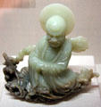 Qing dynasty carved jadeite container depicting Bodhidharma crossing the Yangtze on a Reed from China at Crow Collection of Asian Art. Dallas, TX.