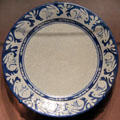 Crackle glaze plate with ring of rabbits by Dedham Pottery of MA at Dallas Museum of Art. Dallas, TX.