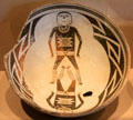 Ceramic black-on-white bowl with two human figures by Mogollon culture of NM at Dallas Museum of Art. Dallas, TX.