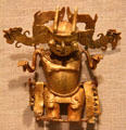 Gold Parita-style pendant with masked figure from Azuero Peninsula, Panama at Dallas Museum of Art. Dallas, TX.
