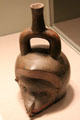 Ceramic Tembladera-style stirrup-spout vessel of composite animal head from north coast , Peru at Dallas Museum of Art. Dallas, TX.