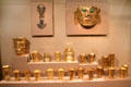 Collection of gold Sicán-culture ceremonial masks, knives & beakers from north coast, Peru at Dallas Museum of Art. Dallas, TX.