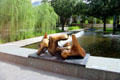 Garden pool with Working Model for Three Piece No. 3 Vertebrae by Henry Moore at Nasher Sculpture Center. Dallas, TX.