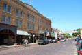 W. Exchange Ave. streetscape with Thannisch block in Fort Worth Stock Yards. Fort Worth, TX.