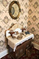 Eastlake vanity set on washstand at Neill-Cochran House Museum. Austin, TX.