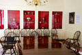 Meeting room with silver collection at Neill-Cochran House Museum. Austin, TX.
