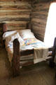 Log bedstead in Frederick Jourdan cabin at Pioneer Farms. Austin, TX.