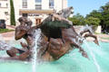 Sculpted men riding seahorses on Littlefield Fountain at University of Texas. Austin, TX