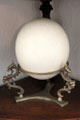 Ostrich egg in holder in Jahn House at Conservation Plaza. New Braunfels, TX.