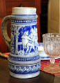 Cobalt blue beer stein with design in relief in Baetge House at Conservation Plaza. New Braunfels, TX