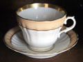 Scalloped porcelain tea cup & saucer in Baetge House at Conservation Plaza. New Braunfels, TX.