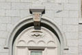 Christian handshake symbol with "I am alpha & omega" statement over entrance of Mormon Temple. Salt Lake City, UT.