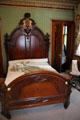 Bedroom with carved bed in Hunter House museum. Norfolk, VA.