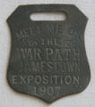 "Meet me on the War Path" souvenir medal from Jamestown Exposition at Moses Myers House museum. Norfolk, VA.