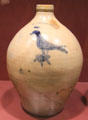 Stoneware jug painted with bird by Bennington Factory at Bennington Museum. Bennington, VT.