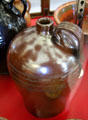 Redware jug engraved with pattern around circumference at Bennington Museum. Bennington, VT.