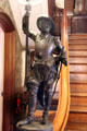 Cavalier statue on main entry hall staircase at Park-McCullough Historic Estate. North Bennington, VT.