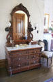 Vanity dresser with mirror in bedroom at Park-McCullough Historic Estate. North Bennington, VT.