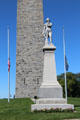 Statue of Col. Seth Warner who with Green Mountain Boys crippled British General Burgoyne's invasion of the American colonies at Bennington Monument. Bennington, VT.