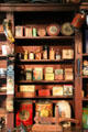 Antique tobacco & gunpowder boxes in General Store at Shelburne Museum. Shelburne, VT.