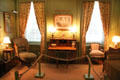 Green guest room in Webb House at Shelburne Museum. Shelburne, VT.
