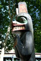 Bear totem pole by Duane Pasco in Occidental Park. Seattle, WA.