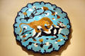 Persian ceramic mosaic of lion attacking a cow at Seattle Art Museum. Seattle, WA.