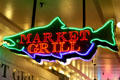 Neon fish sign in Pike Place Market. Seattle, WA