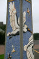 Pelican & birds on tile art column on streets of Long Beach. Long Beach, WA