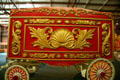 Red & gold circus wagon with Baroque design at Circus World Museum. Baraboo, WI.