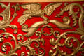 Flying eagle carving detail on red & gold lion tamer circus wagon at Circus World Museum. Baraboo, WI.