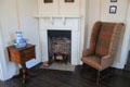 Locally made wing chair beside bedroom fireplace at Craik-Patton House. Charleston, WV.