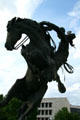 Spirit of Wyoming sculpture in silhouette at State Capitol. Cheyenne, WY.