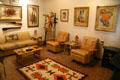 Western artist Burt Procter's studio with paintings & furniture moved to Nelson Museum of the West. Cheyenne, WY.