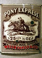 Metal sign for Pony Express overland mail service costing 25 cents / half ounce by Wells Fargo at Buffalo Bill Center of the West. Cody, WY.